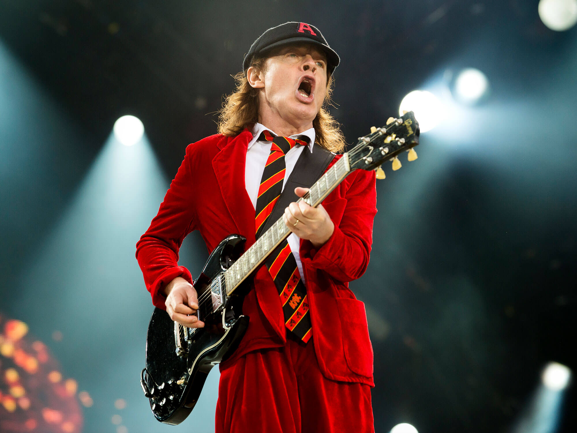 Angus Young performing live