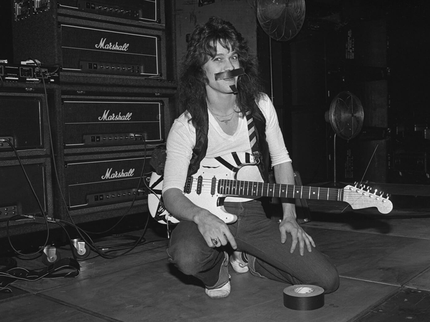 Eddie Van Halen photographed before a stack of Marshall amplifiers in 1978, photo by Lynn Goldsmith/Corbis/VCG via Getty Images