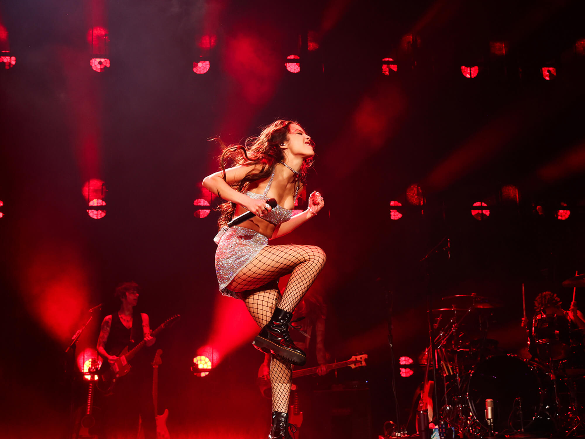 Olivia Rodrigo performing during the ‘GUTS’ world tour at Madison Square Garden in 2024, photo by Kevin Mazur/Getty Images for Live Nation