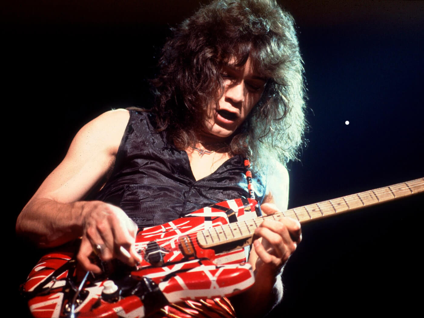 Eddie Van Halen playing his Frankenstein guitar, photo by Paul Natkin/Getty Images